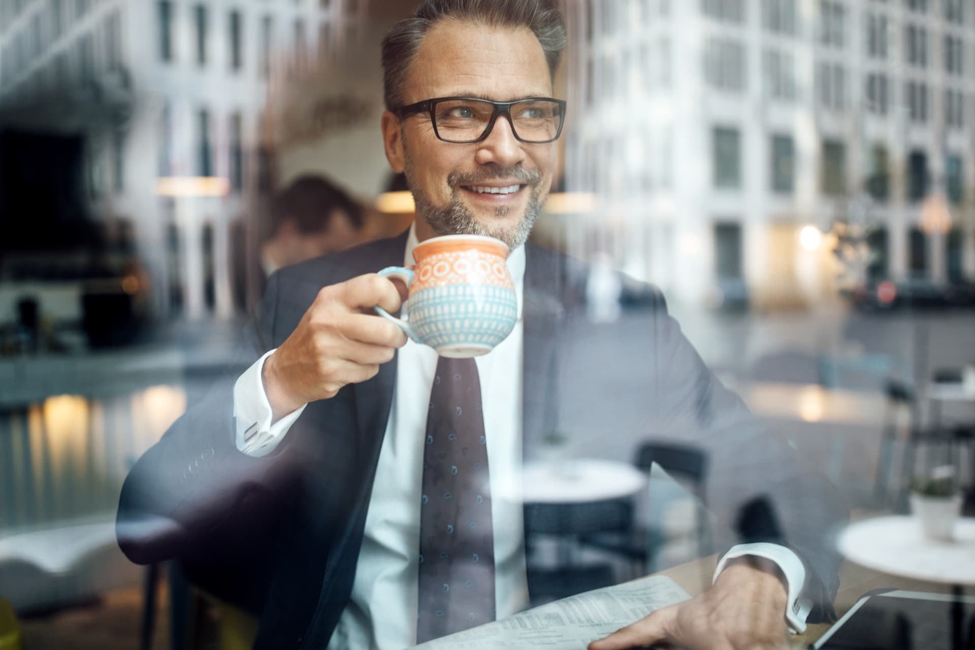 Business leader taking a relaxed coffee break